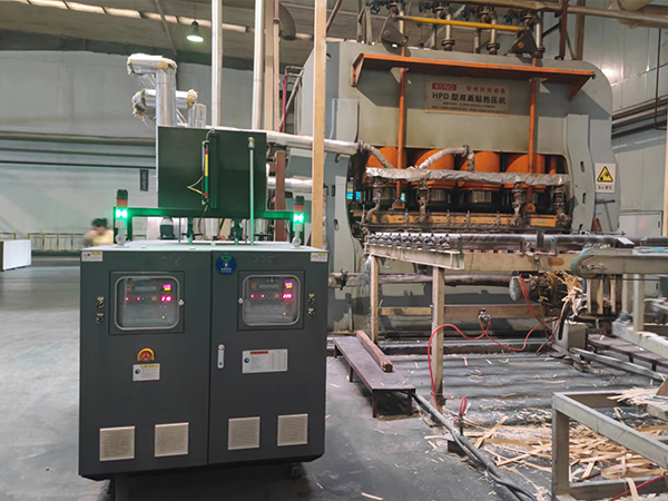 雙機一體模壓模溫機應用于貼面壓制，助力地板強化復合工藝